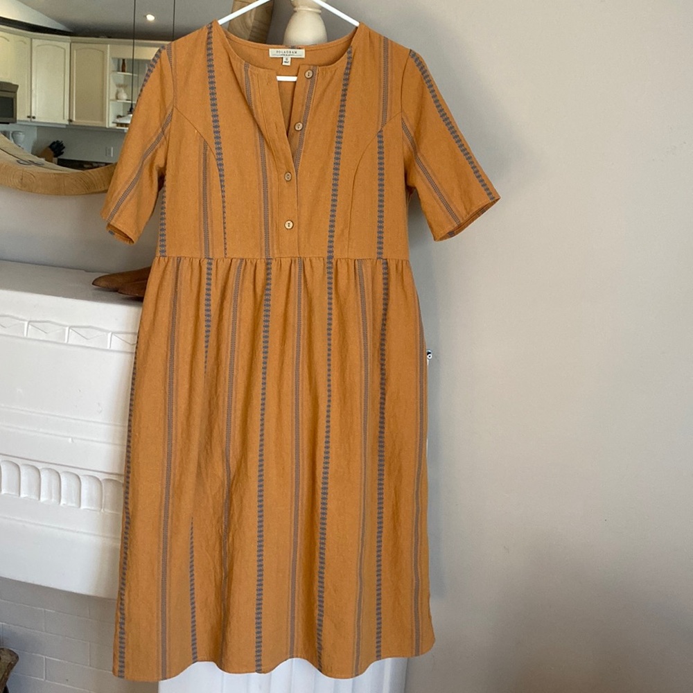 T-shirt dress. It has a worn linen look but is 10%linen.
